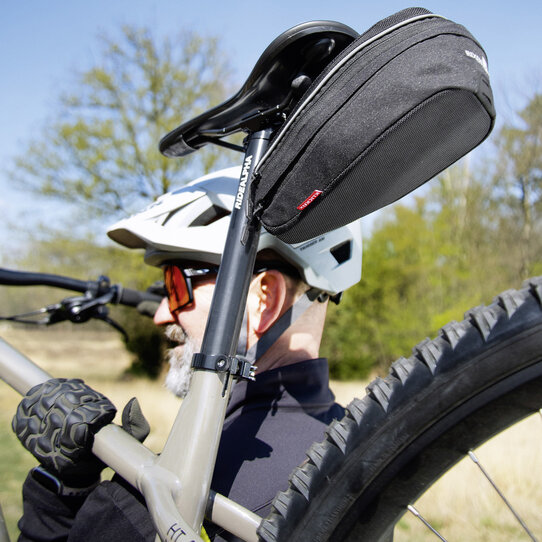 Bikepack Sport Expandable, Compact saddlebag with expandable volume including fixation for folding locks